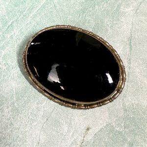 Vintage Onyx oval stone set in a sterling silver rope trim